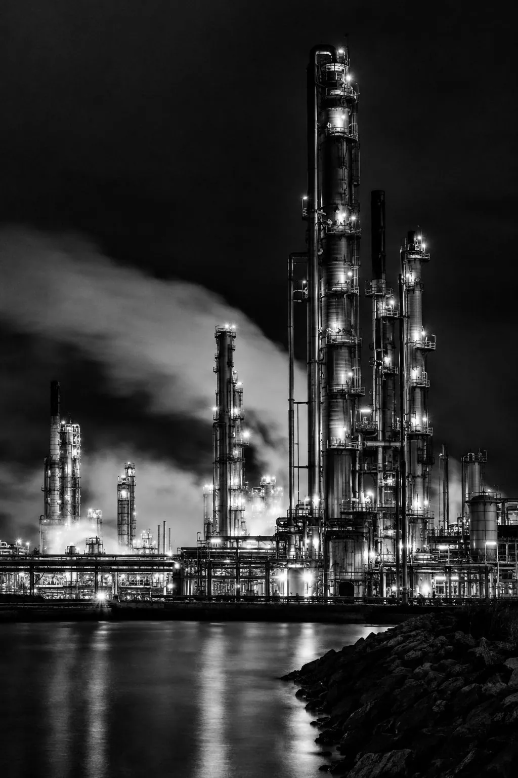 Refinery columns at night